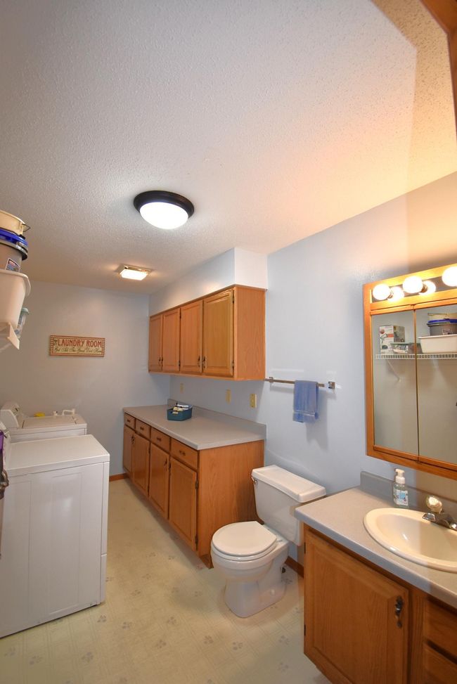 Upper Level Half Bathroom/ Laundry Room | Image 23