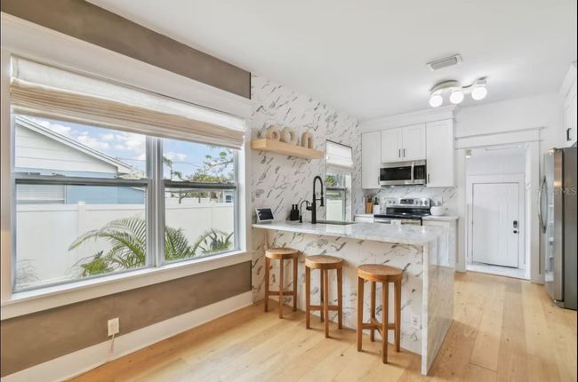 Modern Kitchen w/Waterfall Edge Island | Image 4
