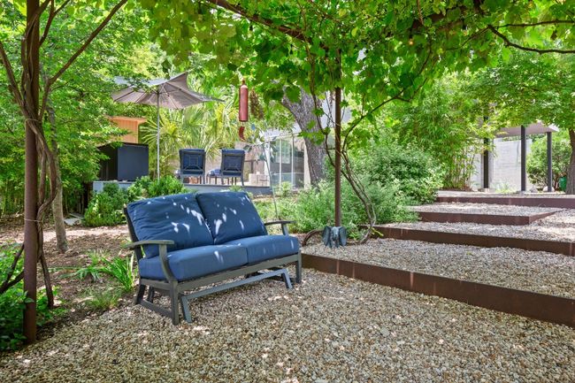 Grape vines, native gardens and flowering plants, something is always in bloom. | Image 35