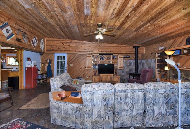 Great Room has a wood burning stove. Look at the beautiful woodwork. | Image 25