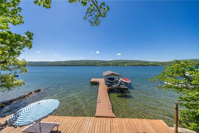 EXPANSIVE WATERFRONT ENTERTAINMENT AREAS WITH PERMANENT DOCK & BOAT STATION. | Image 2