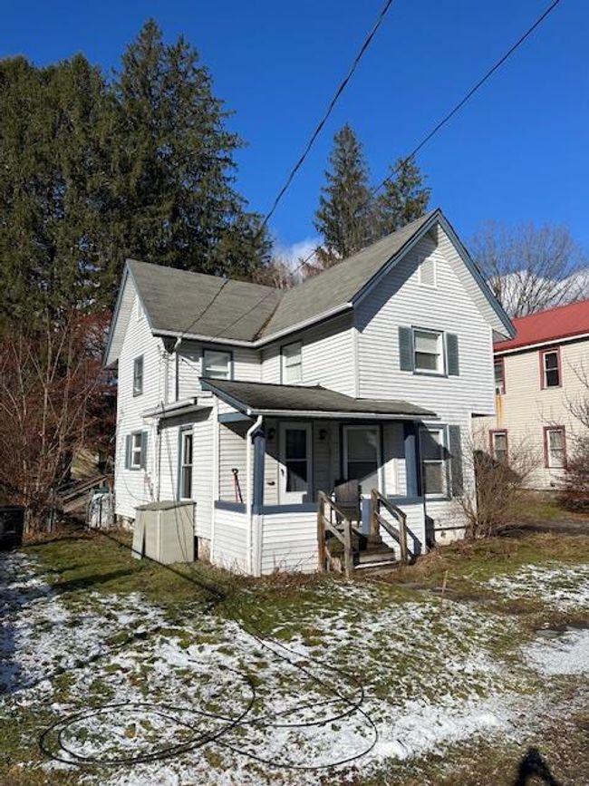 View of front of home with a porch | Image 17