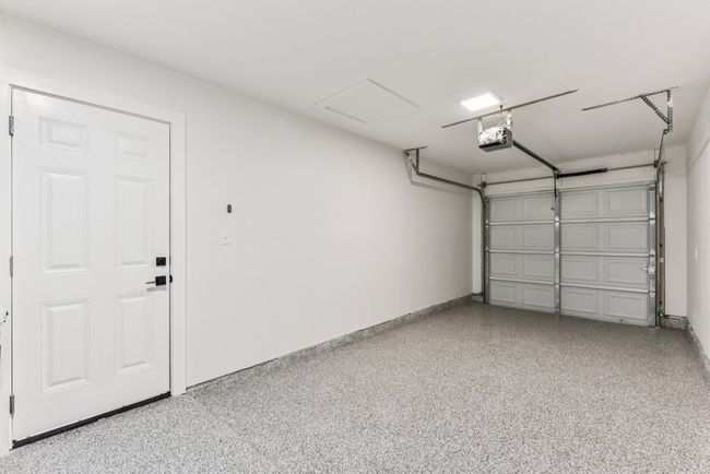 Garage featuring baseboards | Image 30