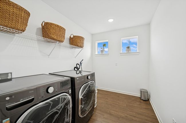 The upstairs laundry room is very practical. | Image 28