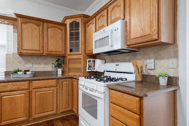 View of the kitchen toward the family room. | Image 19