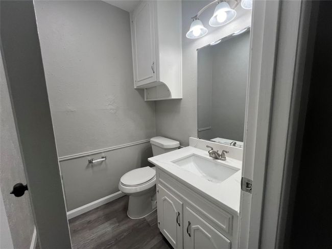 Bathroom featuring wood finished floors and vanity | Image 16