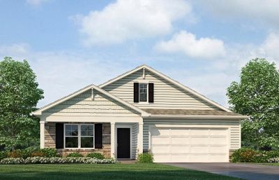 View of front of property featuring a front lawn and a garage | Image 1