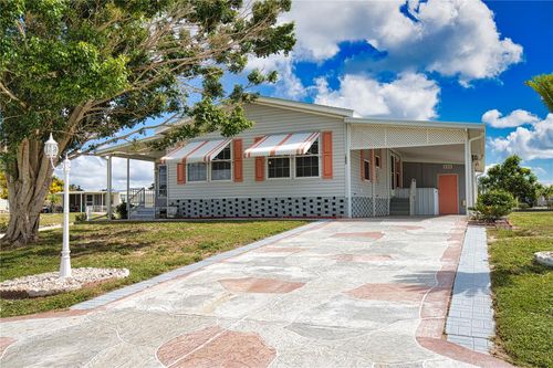 1555 Sanderling Dr, ENGLEWOOD, FL, 34224-4721 | Card Image