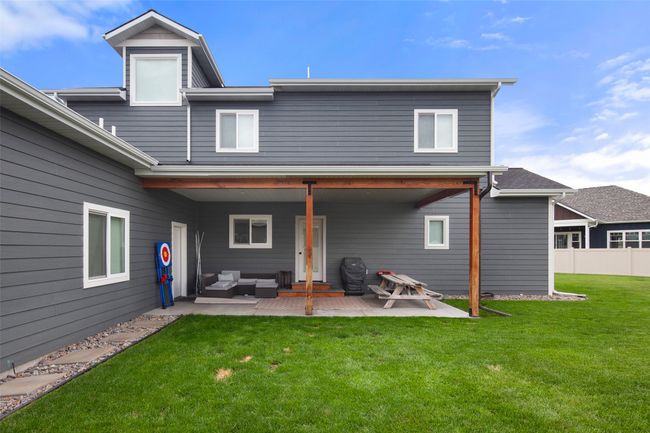 Covered back patio entry to home & garage. | Image 6