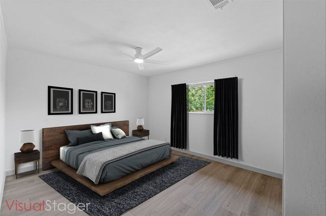 Secondary bedroom overlooking serene back yard (Virtually Staged) | Image 20