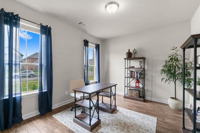 Sunlit study is great for a quiet workspace. | Image 7