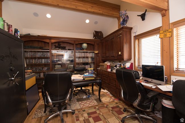 Office area with lofted ceiling | Image 57