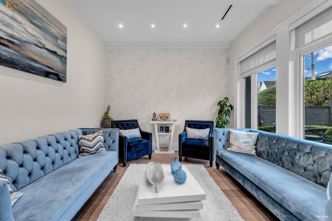 Living room with wood finished floors and recessed lighting | Image 15