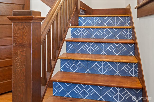 A nod to the home’s heritage with a fresh twist—the stairwell toe kicks feature decorative detailing that’s both stylish and whimsical, bringing unexpected charm and personality to the space with every step. | Image 20