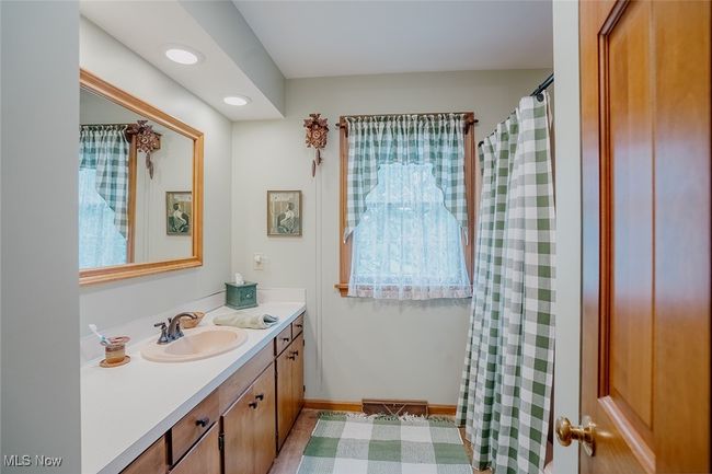 Second level full bath featuring vanity and recessed lighting | Image 26