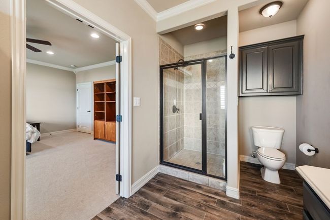 The separate walk in shower is great for a quick clean up or an invigorating way to start your day. | Image 19