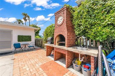 Pizza oven in the courtyard! Unit 2 in back | Image 3