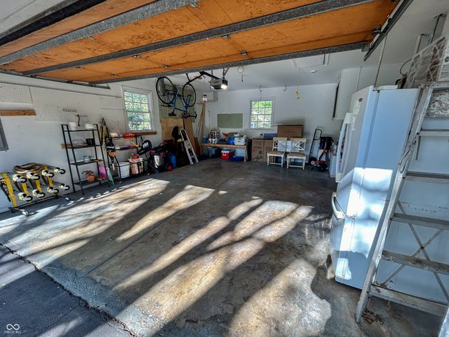 2 car garage with additional flex space, automated door opener | Image 29