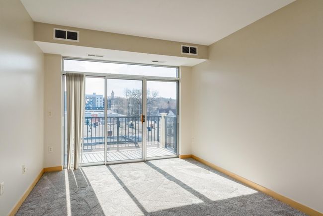 The Floor plan is wide open and gets lots of natural light from the patio.(The photos are of unit 401. Owned by the same person and finishes that are VERY similar) | Image 6