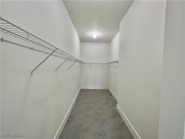 View of walk in closet | Image 19