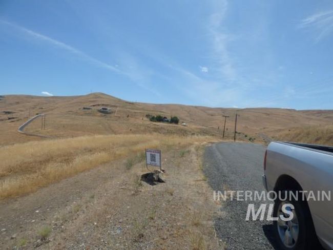 View of road featuring a view of countryside and a mountain view | Image 18