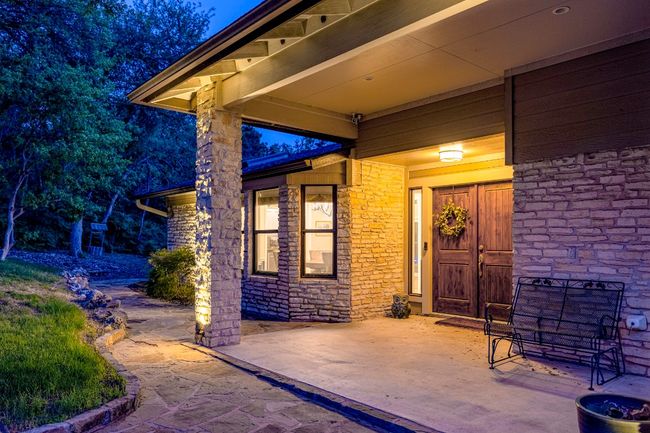 Entryway with flagstone walkway around side of house | Image 10