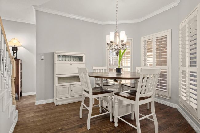 Breakfast room has a second staircase for those late night snack runs from upstairs. | Image 14