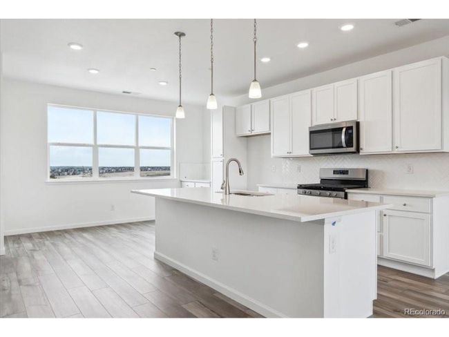 6814 Merseyside Ln, Townhouse with 3 bedrooms, 3 bathrooms and null parking in Castle Pines CO | Image 9