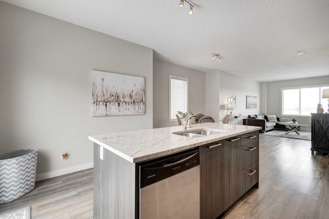 107 - 2802 Kings Heights Gate Se, Home with 3 bedrooms, 2 bathrooms and 2 parking in Airdrie AB | Image 11