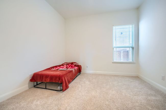 Bedroom with carpet floors and baseboards | Image 20