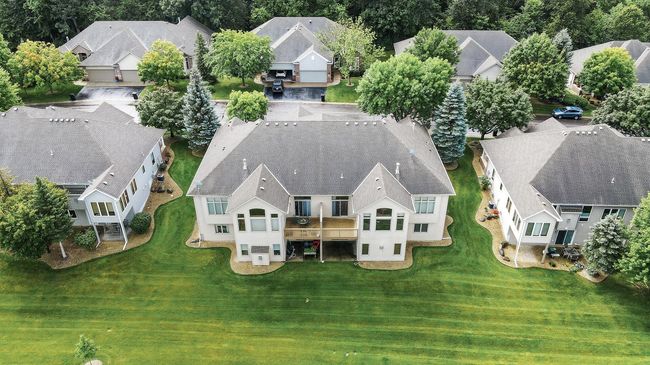 Offering 4 bedrooms, 3 baths and multiple living spaces, this rare find features all living amenities on the main level with plenty of additional space for guests and entertaining! Enjoy a carefree lifestyle with green space, parks & trails galore. | Image 6