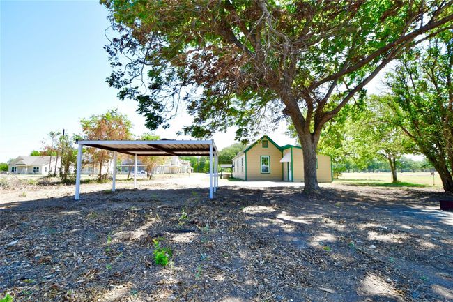 View of yard with a detached carport | Image 15