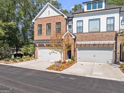 1230 Harper Drive, Townhouse with 3 bedrooms, 2 bathrooms and 4 parking in Alpharetta GA | Image 1