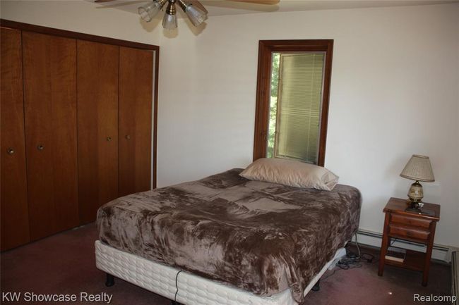 Large double closet in second bedroom. | Image 32