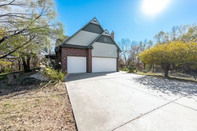 View of side of property featuring a garage | Image 3