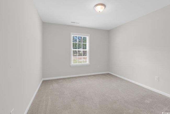 Spare room with carpet flooring and baseboards | Image 15