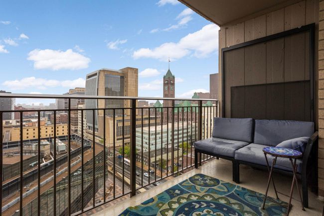 private balcony with stunning city views | Image 22