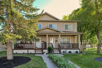 2417 53 Ave Sw, Home with 4 bedrooms, 2 bathrooms and 2 parking in Calgary AB | Image 1