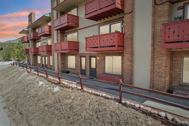 View of property at dusk | Image 23