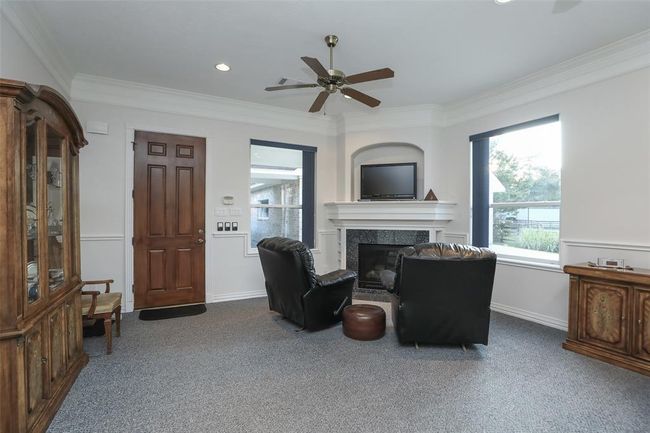 Enjoy the gas log fireplace on those cold winter days. Beautiful Norwegian Granite surround the fireplace. | Image 24
