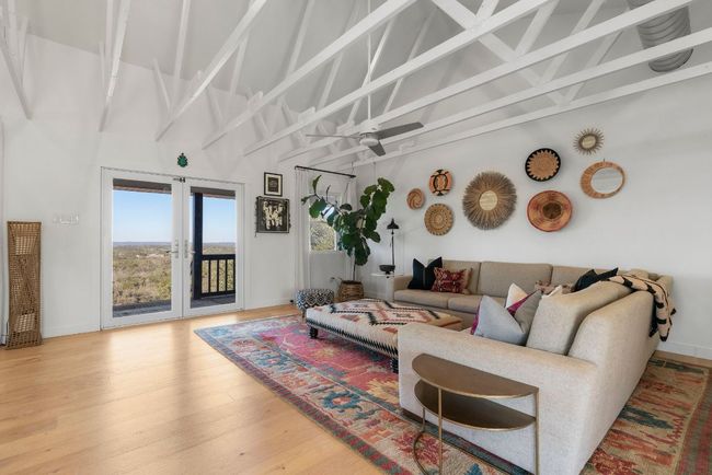 French doors lead out to the front porch | Image 16
