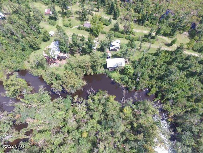 10012 Sw Windsong Way, Home with 3 bedrooms, 3 bathrooms and null parking in Blountstown FL | Image 83