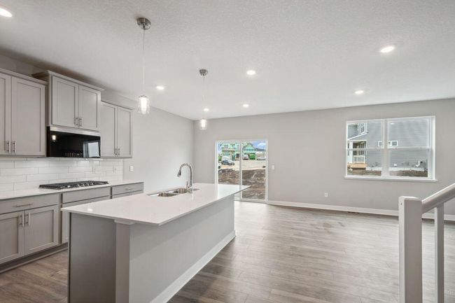 Open and inviting floor plan perfect for entertaining and life! Model photos. Options and colors will vary. | Image 6