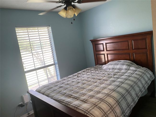 Bedroom with ceiling fan | Image 12
