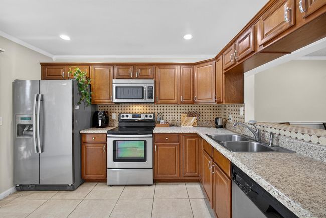 360 Quebec Ct, Condo with 3 bedrooms, 2 bathrooms and null parking in Royal Palm Beach FL | Image 15