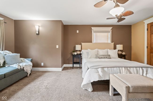 bedroom featuring carpet floors and a ceiling fan | Image 31