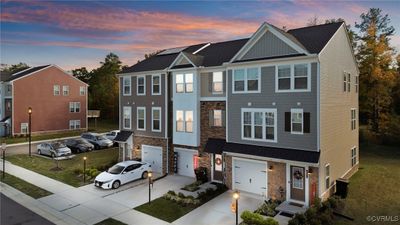 View of front of house featuring a garage | Image 1