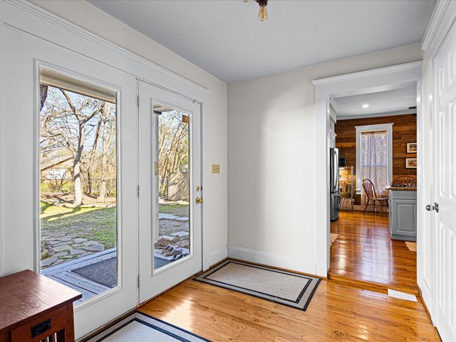 This is the back door entry / exit to the garage and flagstone seating area. | Image 20