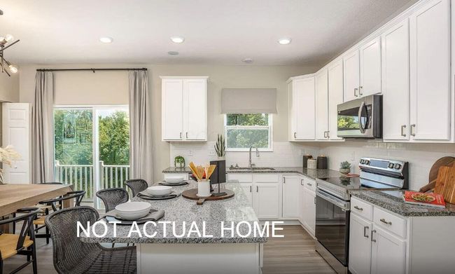 MORE LIGHT STREAMING in FROM REAR DOOR & KITCHEN WINDOW | Image 6