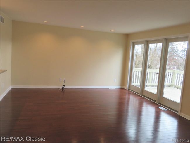 Triple doorwall in the Great Room with access to the deck. | Image 13